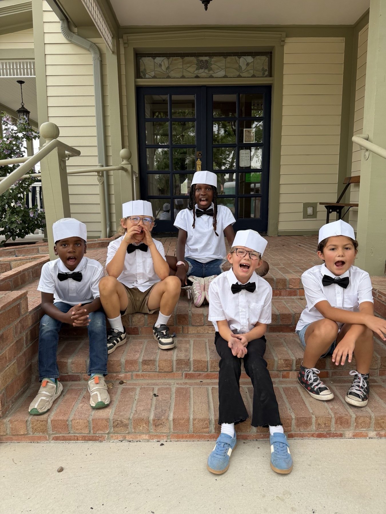 The young Corrales Creamery crew in their uniforms
